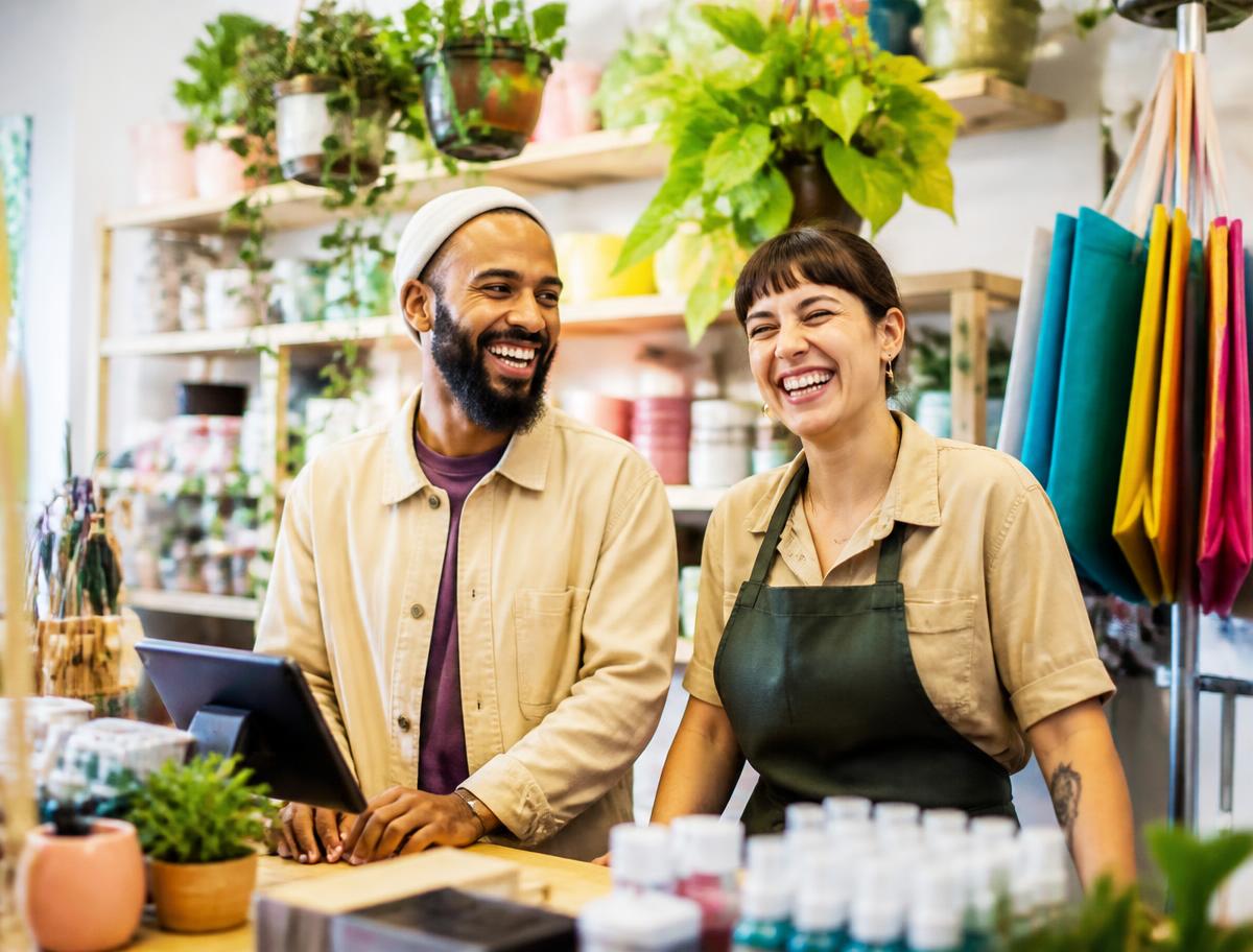 Two business partners planning together in a bright studio